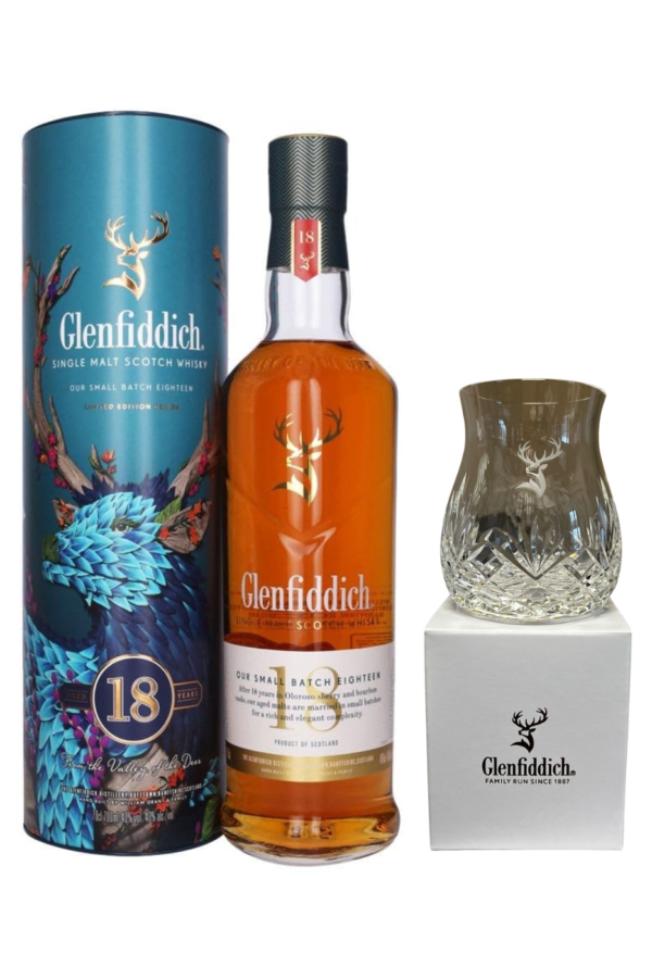 A bottle of whisky from glenfidich showing a handcut glenfiddich branded glass